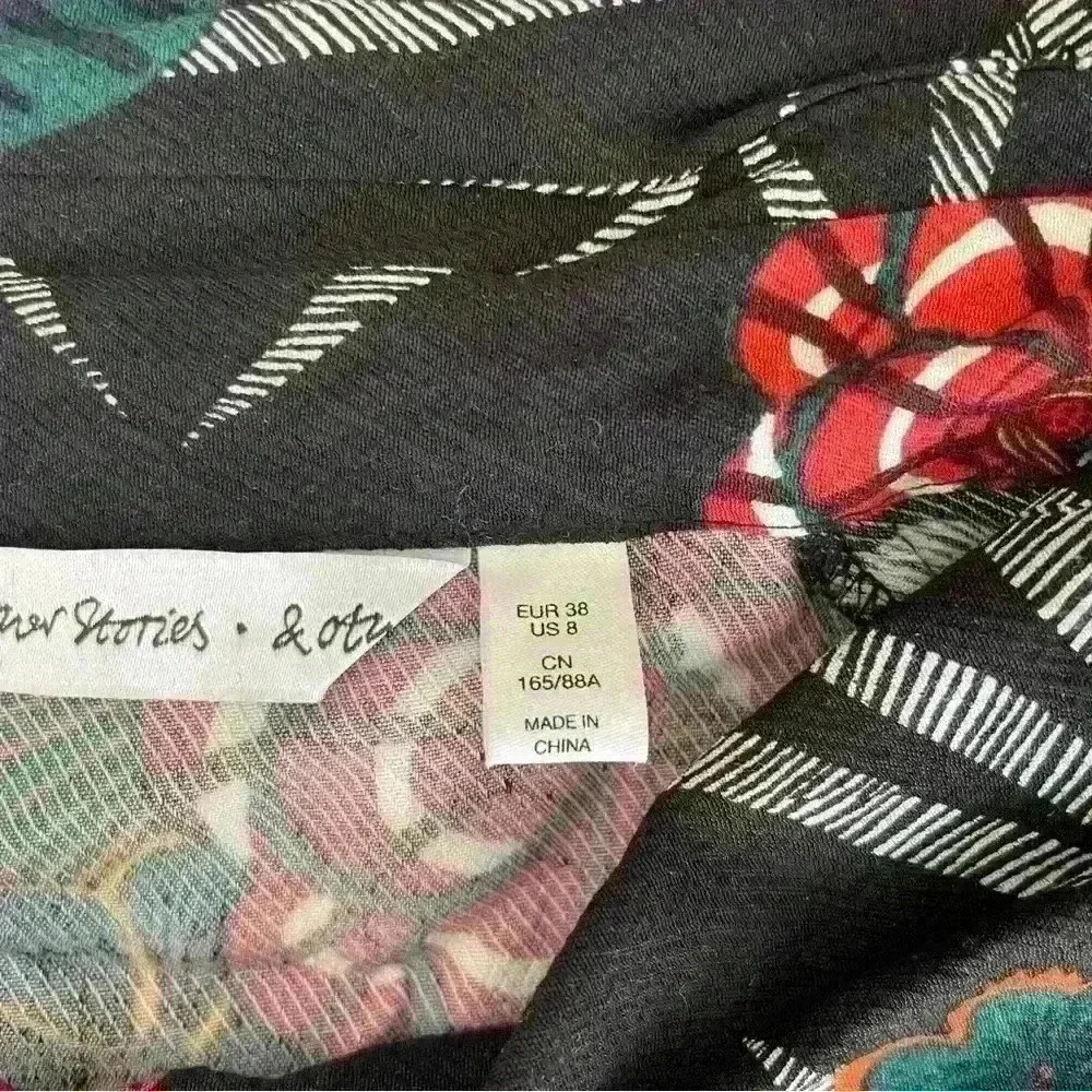 Beautiful & Other Stories Black Floral Dress. Tie neck, side zipper size US 8